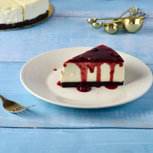 Raspberry Compote + Exquisite New York Cheesecake Slice