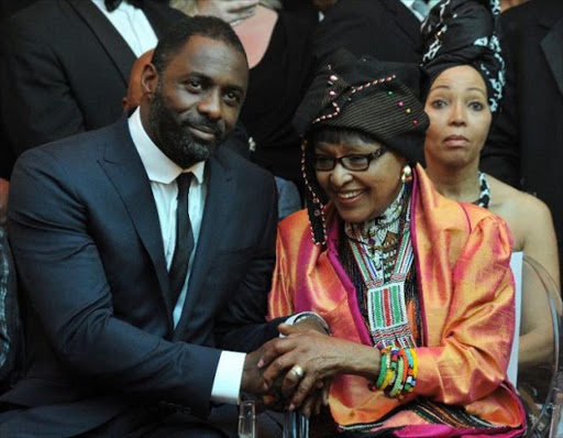 Winnie Madikizela–Mandela and British actor Idris Elba, who plays the role of Nelson Mandela in the movie "Mandela, Long Walk to Freedom", attend the movie's premiere in Johannesburg on November 3, 2013 Picture: AFP