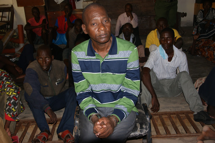 Cult leader Paul Mackenzie and some of his co-accused associates at the Mombasa Law Court basement cells. They could barely walk after staging yet again another hunger strike