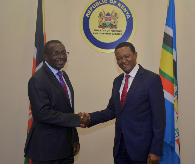 Emmanuel Juma with Foreign and Diaspora Affairs CS Alfred Mutua in his office on Wednesday, August 16, 2023.