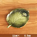 Green ladybug leaves