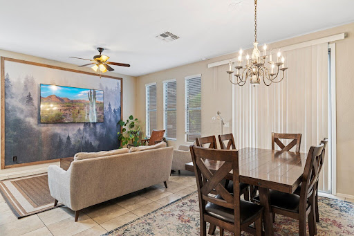 Living dining room with forest wall - Buy this luxury house in Mesa, 3 bedrooms