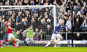 PUNISHED: Steven Naismith, right, of Everton celebrates after scoring the first goal during the English. Premier League match against Arsenal at Goodison Park yesterday. Everton won 3-0
Photo: Alex Livesey/Getty Images