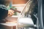 The victim, a woman, managed to jump out of her hijacked vehicle before the chase. Stock photo. 