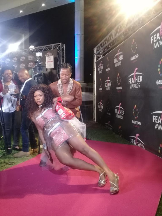 Skolopad posing at the 2017 Feather Awards with her co-designer Koos.