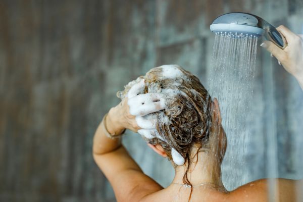 Shampoo less often