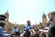 DA leader Mmusi Maimane talks to reporters outside the Union buildings in Pretoria yesterday after inspecting President Jacob Zuma's declaration of interests from 2009.