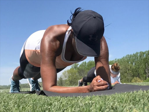 Michelle Obama shared a series of photos of a bootcamp workout on Monday. /DAILY MAIL