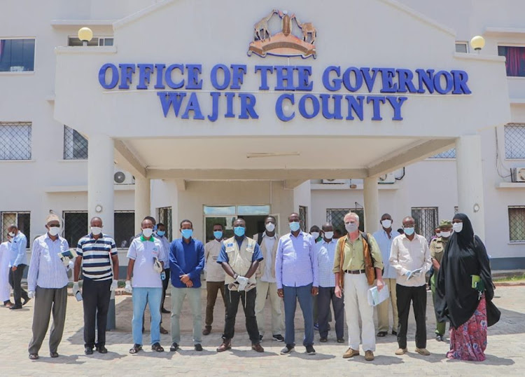 Wajir Governor Mohamed Abdi with a team from the State Department of Agriculture and FAO on Tuesday, April 28, 2020