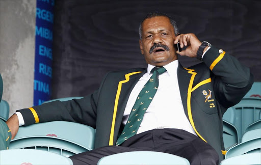 Springboks coach Peter de Villiers talks on his mobile phone during the captain's run at North Harbour Stadium in Auckland, September 29, 2011. The Springboks play against Samoa in their final pool game of the Rugby World Cup in Auckland on Friday