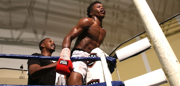 Xolani Mcotheli celebrates after defeating Flint Mdletshe at the Orient.