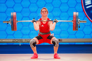 Mona Pretorius of South Africa competes in the women's 63kg weight class during the 2015 International Weightlifting Federation World Championships at the George R. Brown Convention Center on November 25, 2015 in Houston, Texas.
