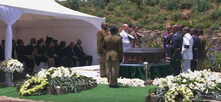 A member of military speaks at the burial site of former South African President Nelson Mandela in his ancestral village of Qunu in the Eastern Cape province, 900km south of Johannesburg, on December 15, 2013.