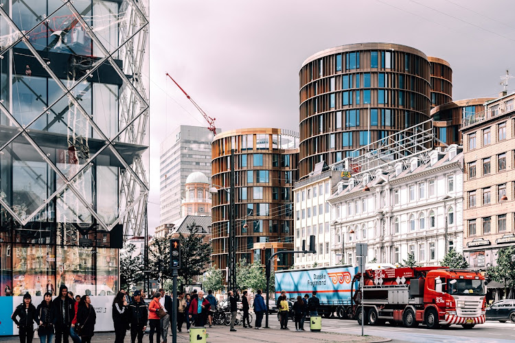 People are shown crossing the street in Copenhagen's financial district..The Danish labour market model could be a template for overhauling SA's labour-business relations, the writer says. Picture: 123RF