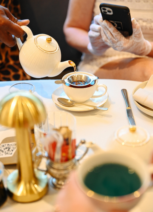 Hot cross bun and unicorn tea (bottom left).