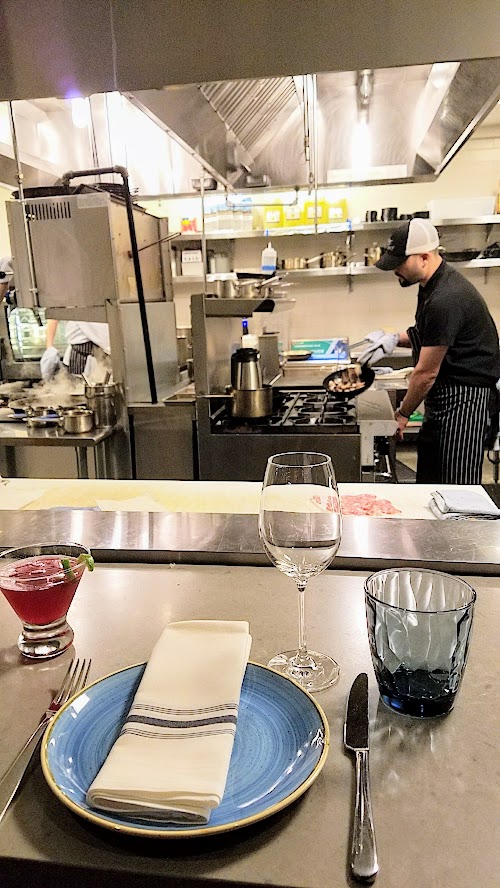 Can Font Happy Hour - the kitchen at Can Font is an open kitchen. There are even kitchen counter seats so you can dine watching all the action your whole meal.