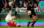 A file photo of Julian Savea pulling away from a tackle during the British and Irish Lions match against the All Blacks of New Zealand at Eden Park in Auckland  2017. Savea is back in Wellington to play for the Hurricanes. 