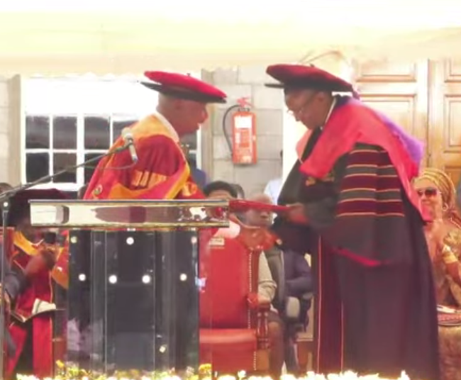 Kabarak university pro-chancellor Gideon Moi awards former chief justice David Maraga with the honorary degree on December 15, 2023.