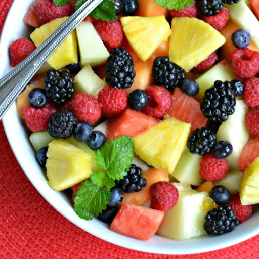 This colorful and refreshing summer fruit salad has all the best summer fruits. Melons, berries, and pineapple come together in this colorful mix that’s perfect for a summer picnic!