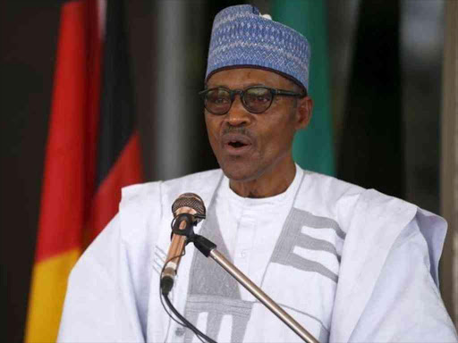 FILE PHOTO - Nigerian President Muhammadu Buhari speaks during German President Joachim Gauck's visit to the State House in Abuja, Nigeria February 11, 2016. REUTERS