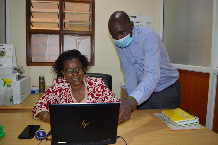 Kiambu county government vocational training director Emily Nkoroi with her assistant director Wilfred Nyarangi