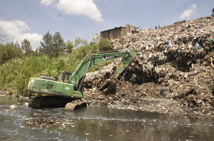 Solid waste illegally dumped in Ngong river at Mihang'o on October 9.