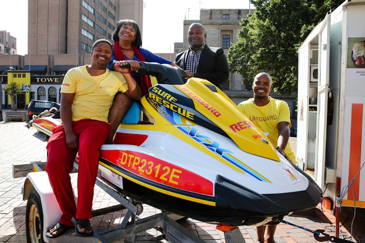 Bay mayor Eugene Johnson delivered the key note address at the media launch of the 2022 Nelson Mandela Bay Splash Festival at the City Hall on Tuesday. With her, from left, are lifeguard Ferdi Smit, mayoral committee member for sport, recreation, arts and culture Bassie Kamana and lifeguard Zamiwonga Gangca