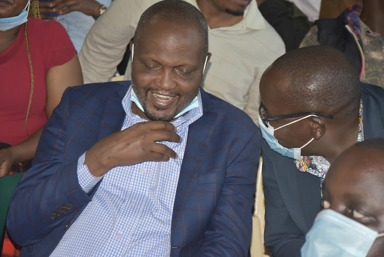 Gatundu South MP Moses Kuria and Juja MP George Koimburi.