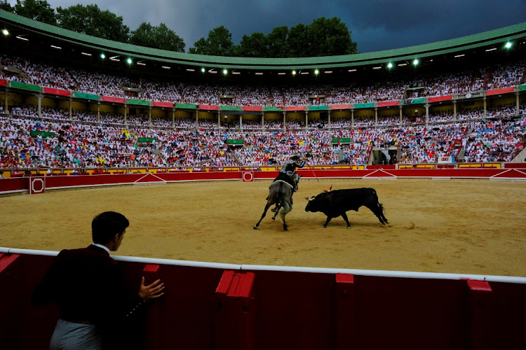 Spanish rejoneador (mounted bullfighter) Pablo Hermoso de Mendoza performs during a bullfight at Sanfermines.