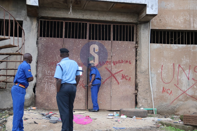 Police officers manning the building after ensuring a safe evacuation on November 20.