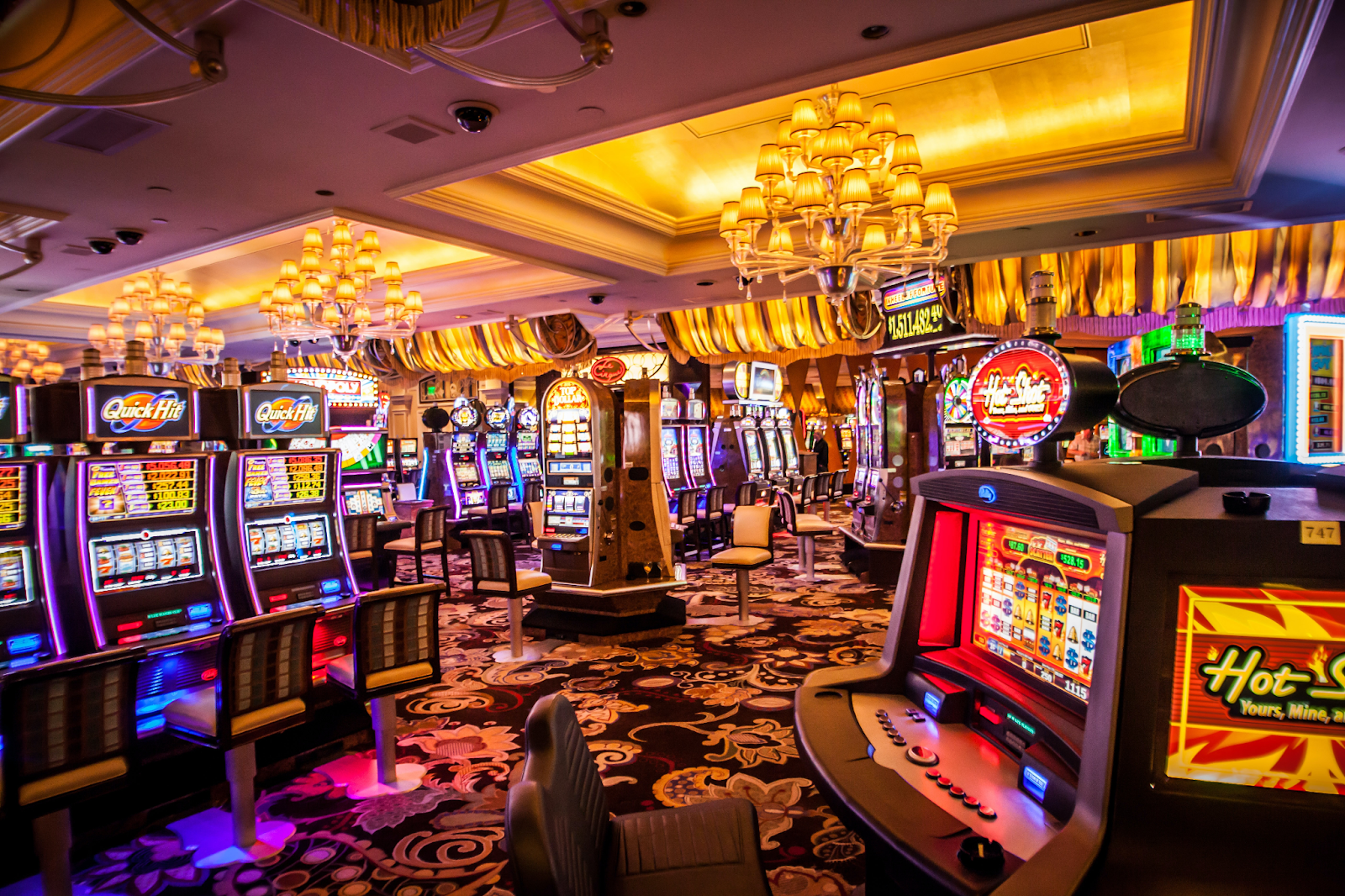 A bustling scene with multiple vibrant slot machines lined up in rows