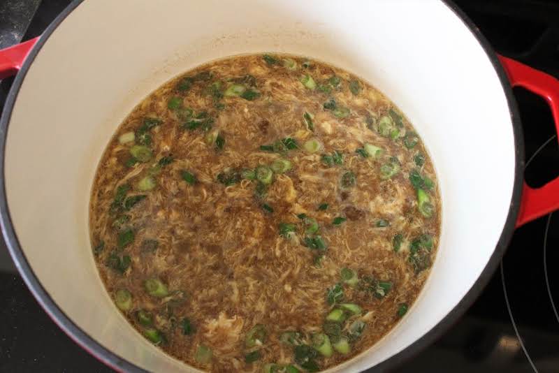 Stirring In Green Onions.