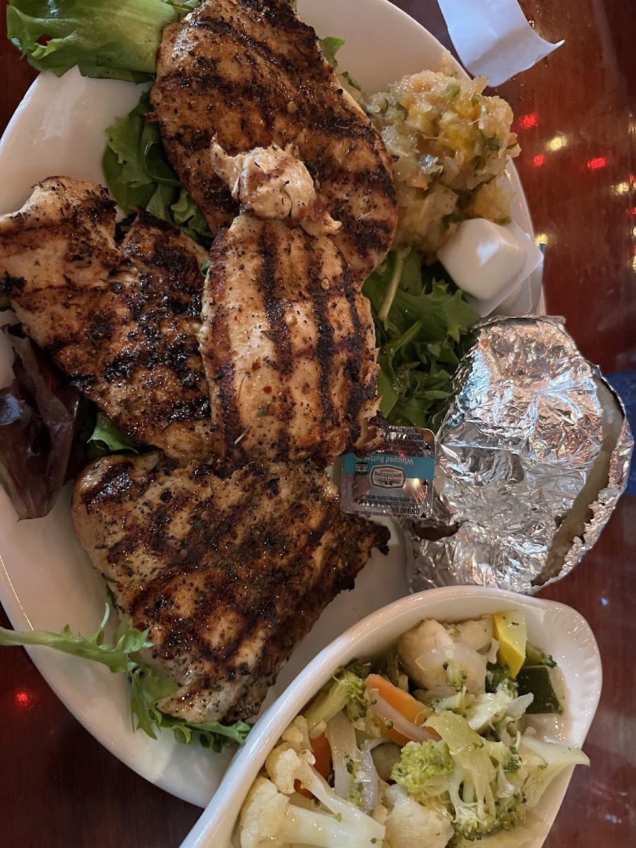 Carribean Jerk Chicken w baked potato and veggies