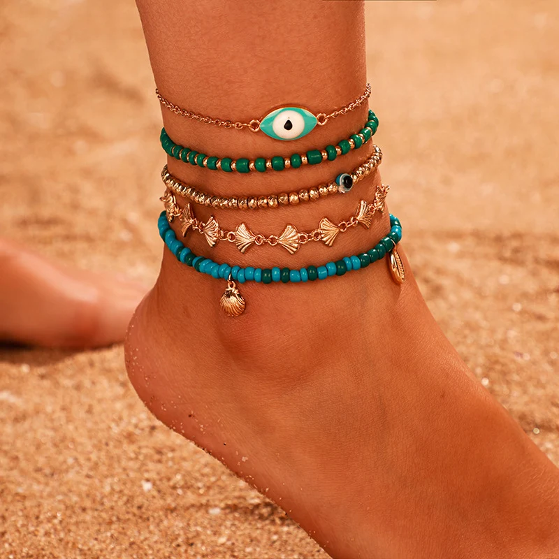 5-delige enkelband met rijstparels en oogschelp, perfect voor een stijlvolle, zomerse en bohemien look voor je voeten.