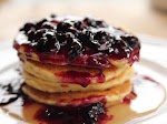 Cornmeal Pancakes with Blueberry Syrup was pinched from <a href="http://www.foodnetwork.com/recipes/ree-drummond/cornmeal-pancakes-with-blueberry-syrup" target="_blank">www.foodnetwork.com.</a>