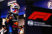 Max Verstappen celebrates in parc ferme after securing pole position for the Saudi Arabian Grand Prix.