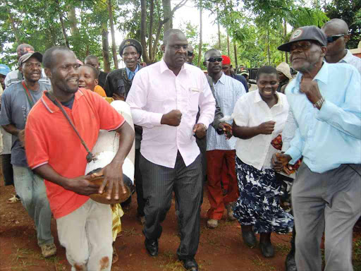 Emuhaya MP Omboko Milemba is welcomed by his supporters at his home in Esirulo, Emuhaya