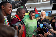 Advocates Tembeka Ngcukaitobi and Doc Mashabane speak to the media as members of the South African legal team representing South Africa's case against Israel at the International Court of Justice (ICJ) arrive at OR Tambo International airport, after their request for emergency measures to order Israel to stop its military actions in Gaza, in Johannesburg, South Africa, January 14.