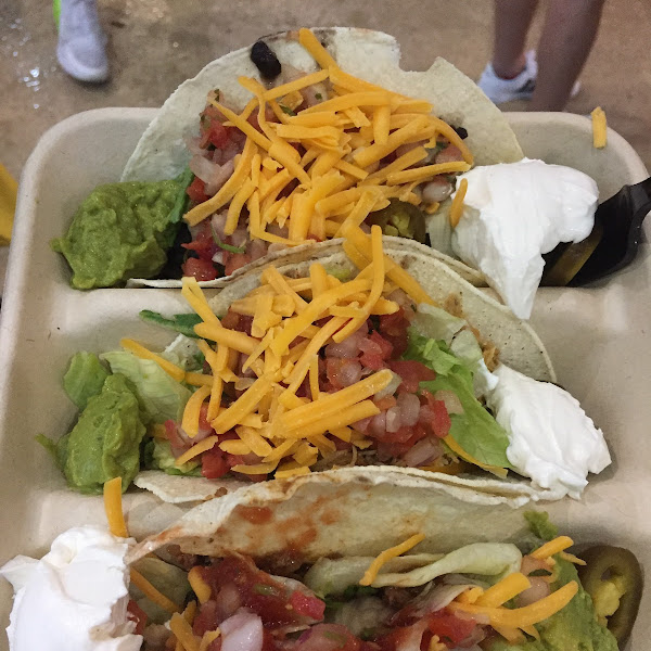 Tacos from section 32. Ask for corn tortillas in back. Pulled chicken, black bean and ground beef tacos shown.