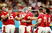 Jonathan Davies of Wales celebrates with his team mates after scoring his sides first try during the Rugby World Cup 2019 Group D game between Wales and Georgia at City of Toyota Stadium on September 23, 2019 in Toyota, Aichi, Japan. 