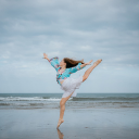 Girl dancing on the beach