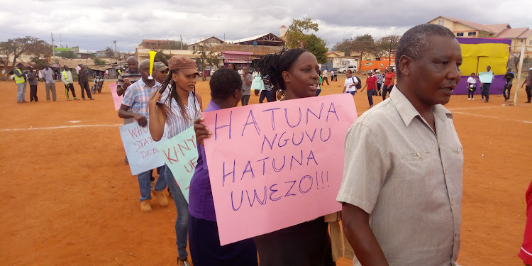 Taita Taveta health workers demonstrates at Moi Stadium in Voi over delayed salaries on September 26, 2019