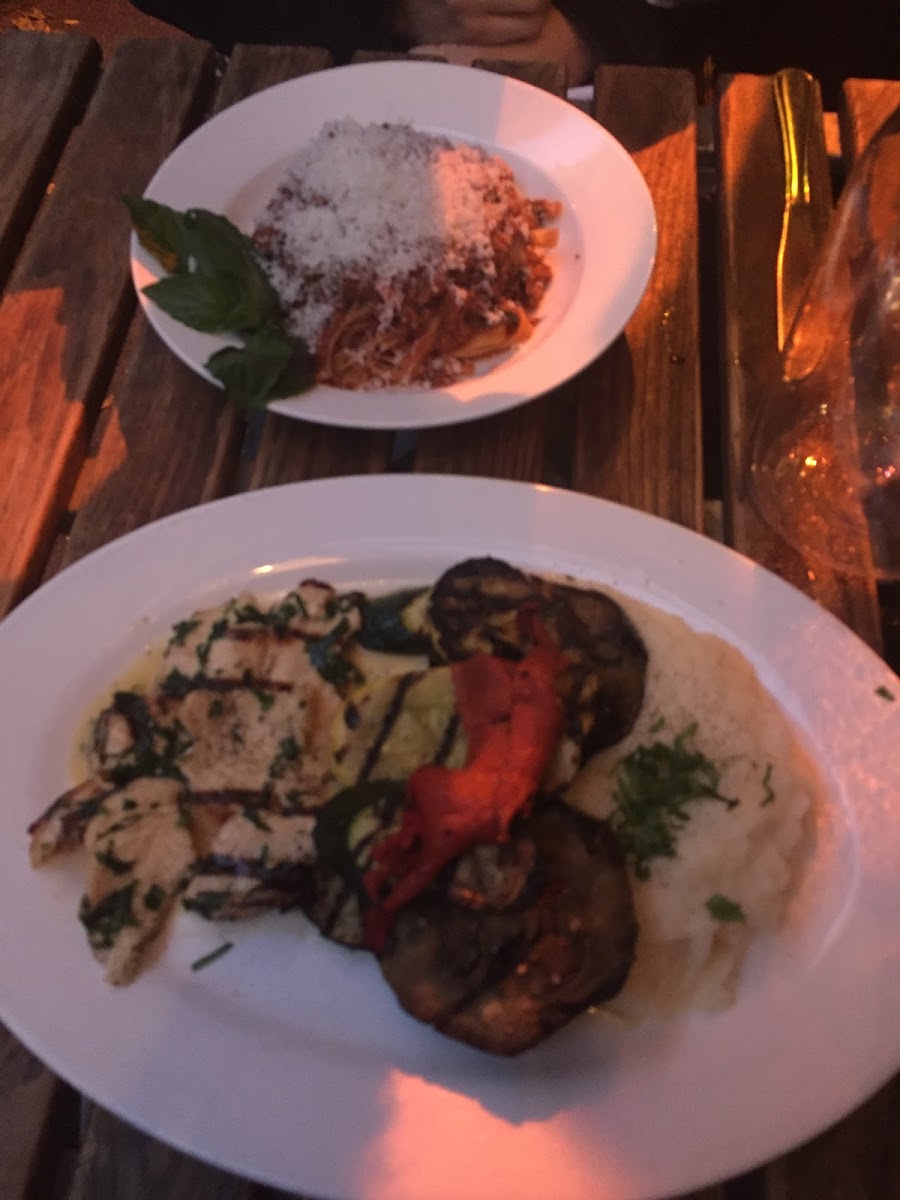 Grilled chicken, mashed potatoes and veggies! Along with a pasta dish