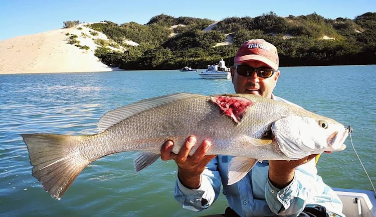 Chris Schoultz with his strange catch