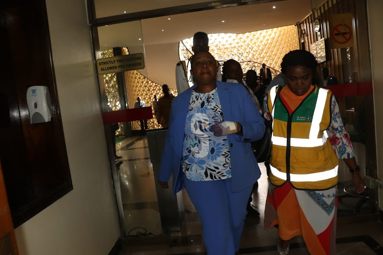 Nominated MP Sabina Chege being escorted by St. Johns Ambulance staffer after she was injured during a commotion in Parliament in June 8,2023.