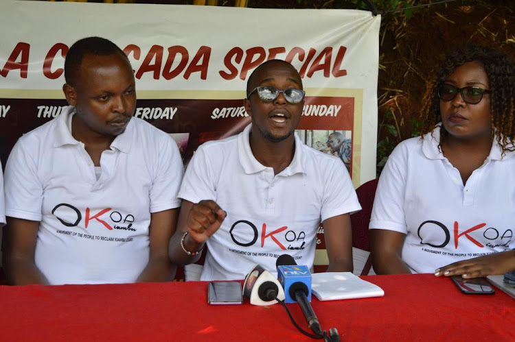 Okoa Kiambu members Hoswell Kinuthia, James Wanganga and Carol wanjiku during a press conference on Tuesday.