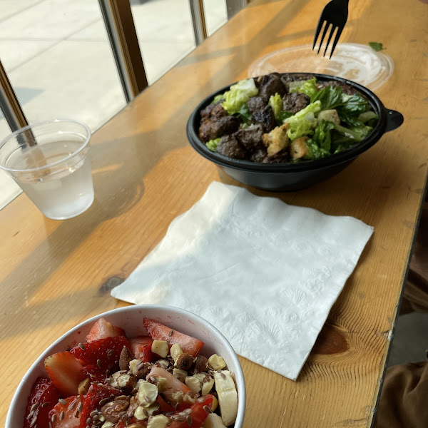 Peanut butter and Berry bowl and a Cesar salad