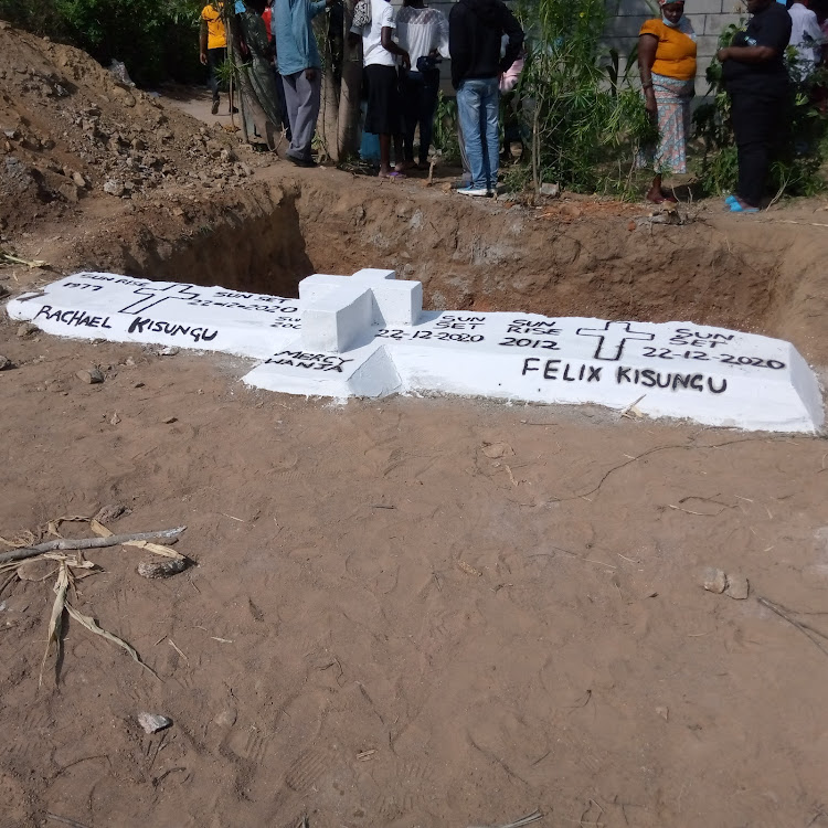 The grave where Rachael and her two children were interred on Saturday