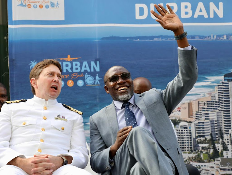 Queen Mary captain Andrew Hall with eThekwini municipality mayor Mxolisi Kaunda at a reception for the liner's arrival in Durban.