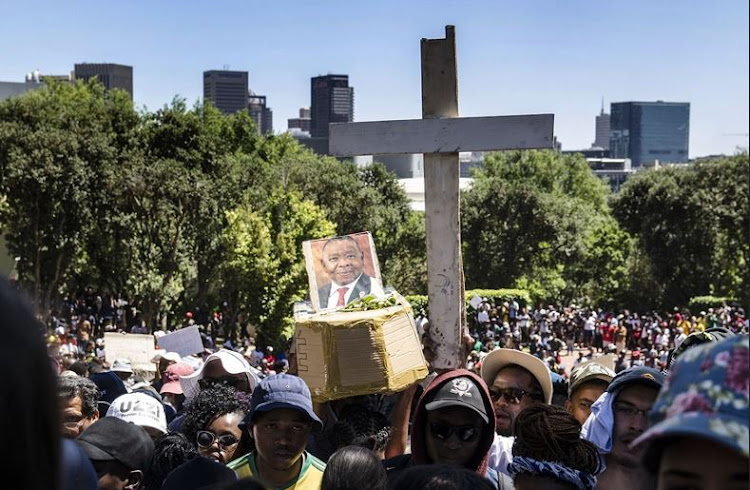 Students with a made-up coffin for Minister Blade Nzimande at the CPUT campus ahead of a protest march to parliament on 26 October 2016.